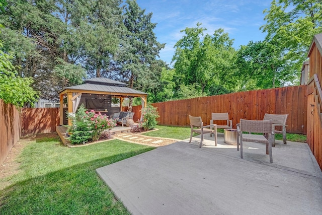 view of yard featuring a gazebo, a patio area, and an outdoor living space