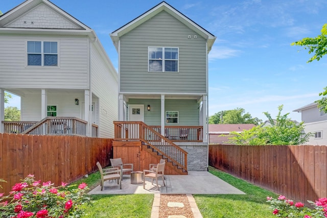 rear view of house featuring a patio area
