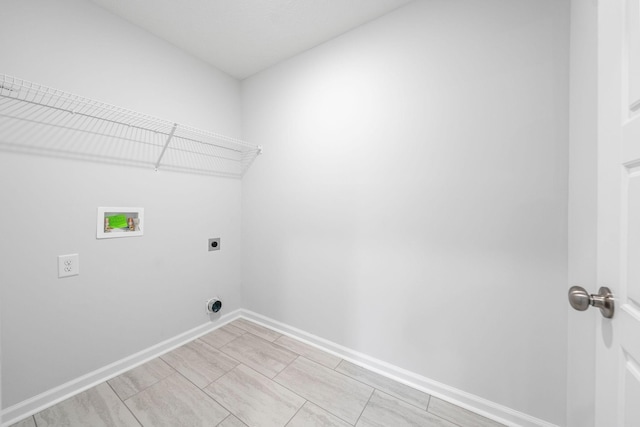 209 Wesson Dr, Clarksville, TN 37043 - laundry area with hookup for an electric dryer, washer hookup, and baseboards