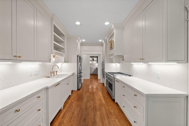 3031 Trice Pl, Lebanon, TN 37087 - kitchen with a sink, stainless steel appliances, open shelves, tasteful backsplash, and white cabinetry