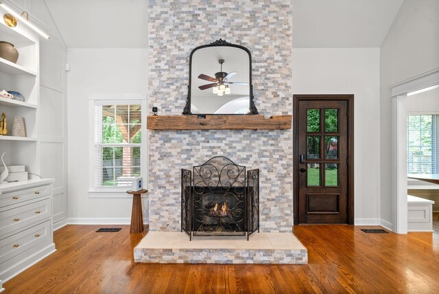 3031 Trice Pl, Lebanon, TN 37087 - living area with wood finished floors, baseboards, ceiling fan, and a fireplace