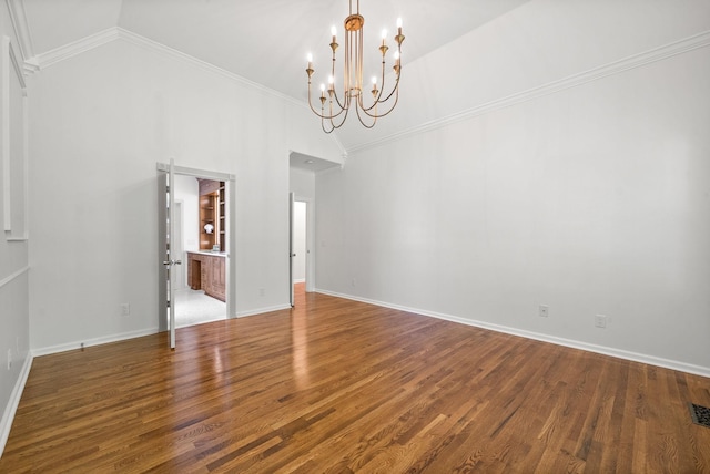 3031 Trice Pl, Lebanon, TN 37087 - unfurnished dining area with a chandelier, wood finished floors, crown molding, baseboards, and high vaulted ceiling