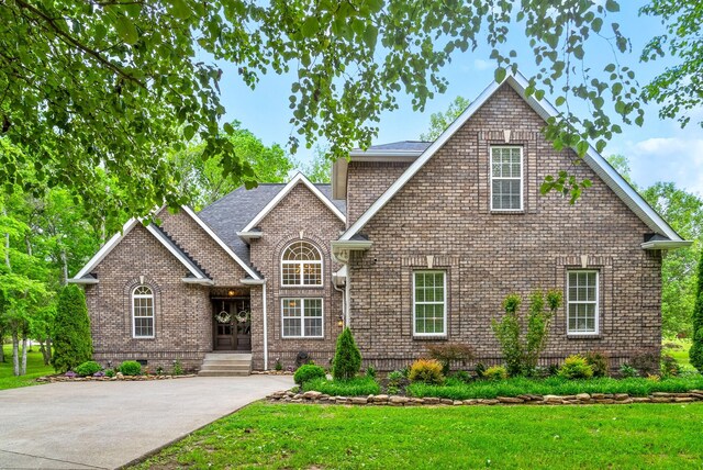 3031 Trice Pl, Lebanon, TN 37087 - craftsman-style home with a front yard, brick siding, and crawl space