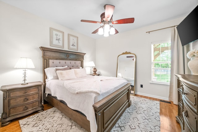 3031 Trice Pl, Lebanon, TN 37087 - bedroom featuring light wood-type flooring, ceiling fan, and baseboards