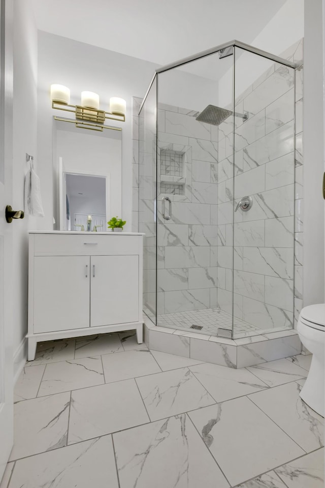 1206 Forest Lake Ct, Franklin, TN 37064 - bathroom with a stall shower, marble finish flooring, vanity, toilet, and baseboards