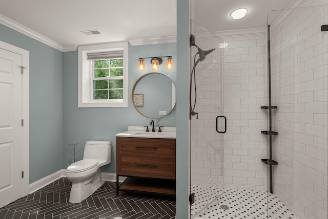 bathroom featuring a shower stall, crown molding, vanity, toilet, and baseboards