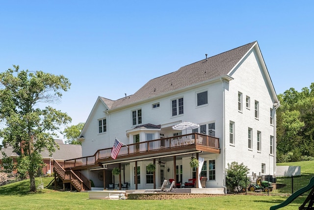 rear view of house with ceiling fan, a patio, stairs, and a wooden deck