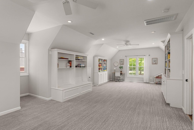 rec room featuring ceiling fan, light colored carpet, vaulted ceiling, recessed lighting, and baseboards