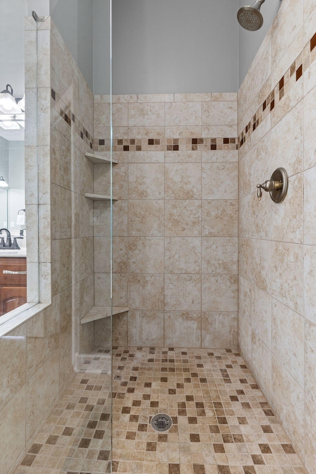 1115 Rossifer Ct, Gallatin, TN 37066 - bathroom featuring tiled shower and a sink