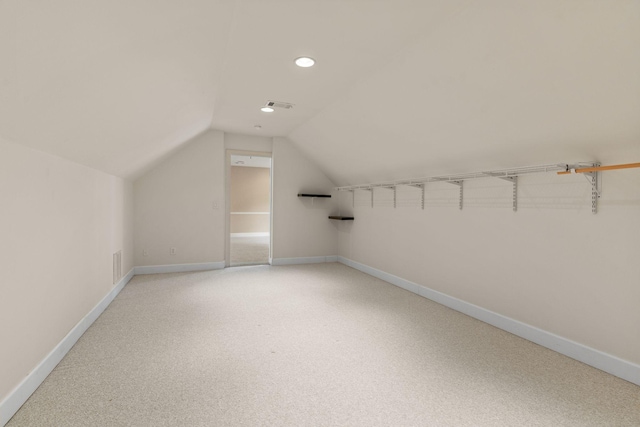1115 Rossifer Ct, Gallatin, TN 37066 - additional living space with vaulted ceiling, baseboards, recessed lighting, and light carpet