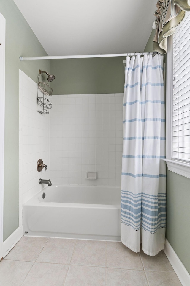 1115 Rossifer Ct, Gallatin, TN 37066 - bathroom featuring tile patterned flooring, shower / bath combo with shower curtain, and baseboards