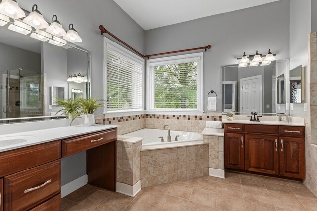 1115 Rossifer Ct, Gallatin, TN 37066 - full bathroom with a garden tub, a stall shower, tile patterned floors, and two vanities