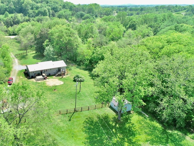 view from above of property featuring a forest