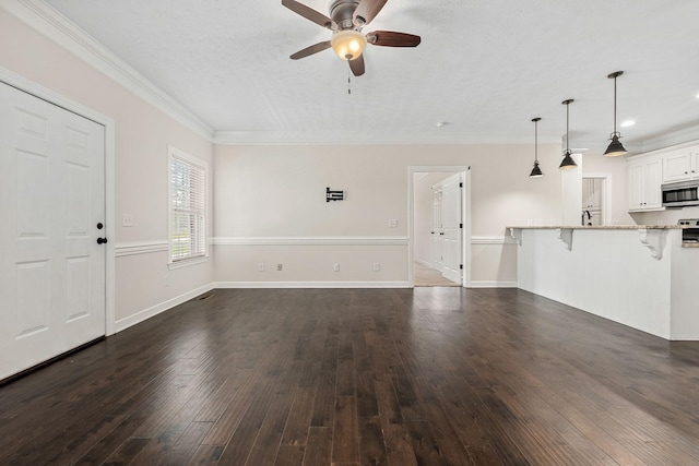 1165 Short Springs Rd, Tullahoma, TN 37388 - unfurnished living room with a ceiling fan, dark wood-style floors, crown molding, baseboards, and recessed lighting