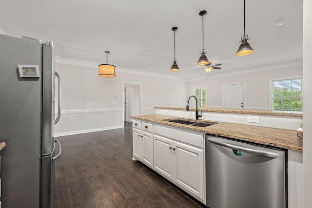 1165 Short Springs Rd, Tullahoma, TN 37388 - kitchen with stainless steel appliances, a sink, dark wood-style floors, white cabinetry, and a ceiling fan
