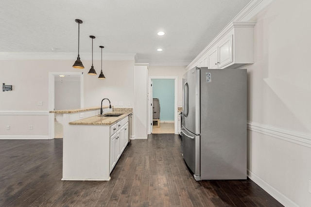 1165 Short Springs Rd, Tullahoma, TN 37388 - kitchen with freestanding refrigerator, a sink, a peninsula, dark wood-style flooring, and recessed lighting