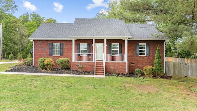 1165 Short Springs Rd, Tullahoma, TN 37388 - view of front of property featuring brick siding, roof with shingles, and a porch