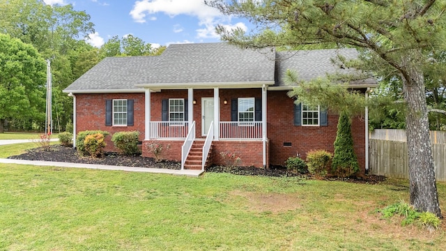 1165 Short Springs Rd, Tullahoma, TN 37388 - view of front of property with covered porch, a shingled roof, and brick siding
