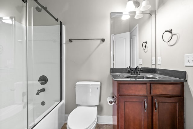 full bath with toilet, vanity, and enclosed tub / shower combo