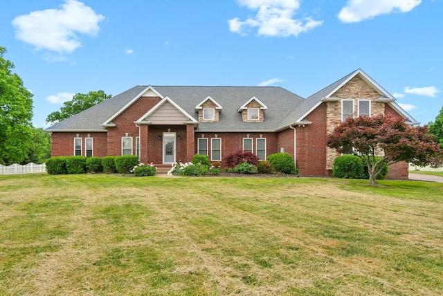 craftsman-style home featuring brick siding