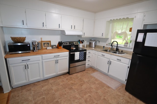 800 E Grigsby St, Pulaski, TN 38478 - kitchen with appliances with stainless steel finishes, a sink, under cabinet range hood, and white cabinetry