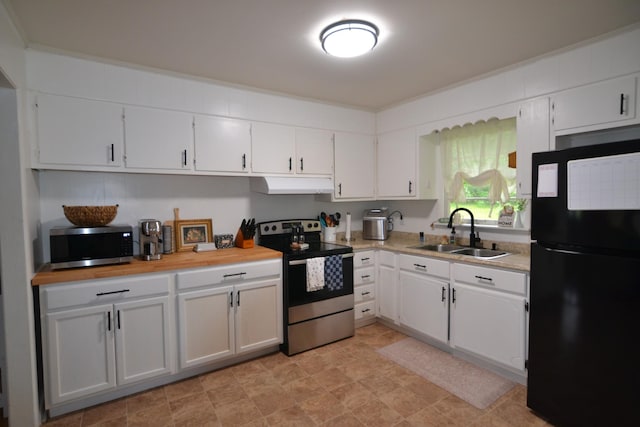 800 E Grigsby St, Pulaski, TN 38478 - kitchen featuring appliances with stainless steel finishes, a sink, under cabinet range hood, and white cabinets
