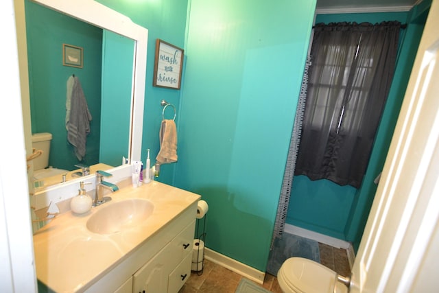 800 E Grigsby St, Pulaski, TN 38478 - half bath with toilet, baseboards, vanity, and tile patterned flooring