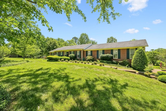 9209 Concord Rd, Brentwood, TN 37027 - ranch-style house with a front lawn and brick siding