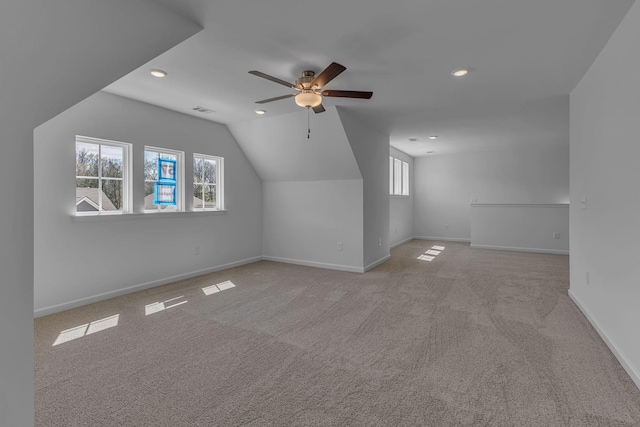 bonus room with carpet flooring, a ceiling fan, recessed lighting, plenty of natural light, and lofted ceiling