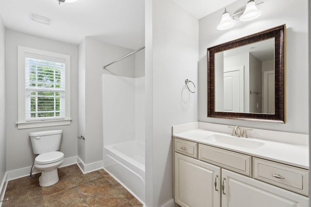 1000 Swanson Ln, Franklin, TN 37064 - full bathroom with baseboards, toilet, vanity, stone finish flooring, and bathtub / shower combination