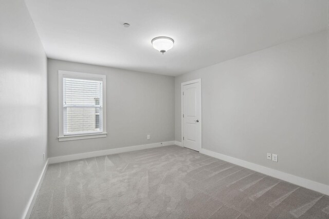 1000 Swanson Ln, Franklin, TN 37064 - spare room featuring carpet flooring and baseboards
