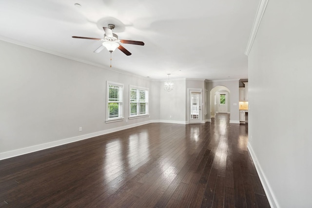 1000 Swanson Ln, Franklin, TN 37064 - unfurnished living room with ornamental molding, ceiling fan, a chandelier, dark wood-type flooring, and baseboards