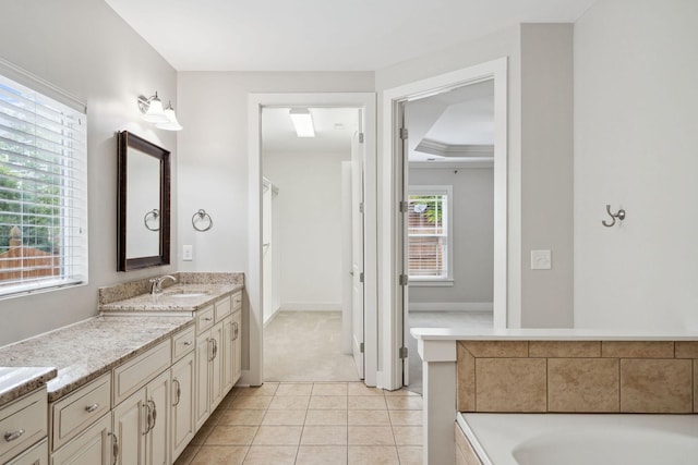 1000 Swanson Ln, Franklin, TN 37064 - bathroom featuring tile patterned flooring, vanity, a bathtub, and baseboards
