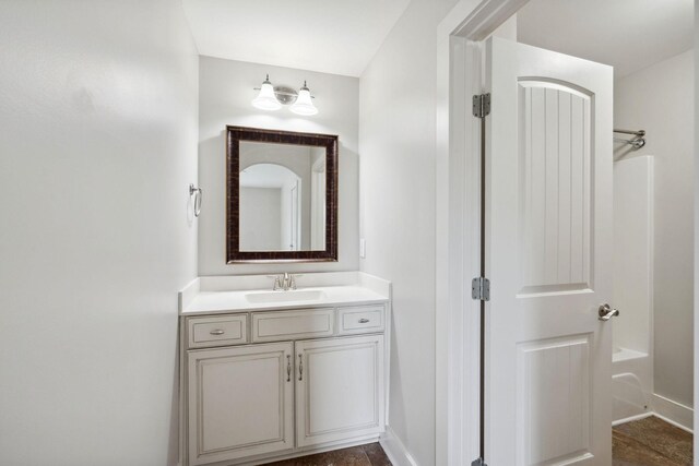 1000 Swanson Ln, Franklin, TN 37064 - bathroom with vanity, baseboards, and  shower combination