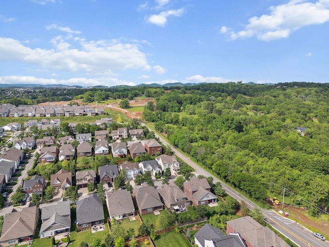 1000 Swanson Ln, Franklin, TN 37064 - aerial overview of property's location featuring nearby suburban area and a forest
