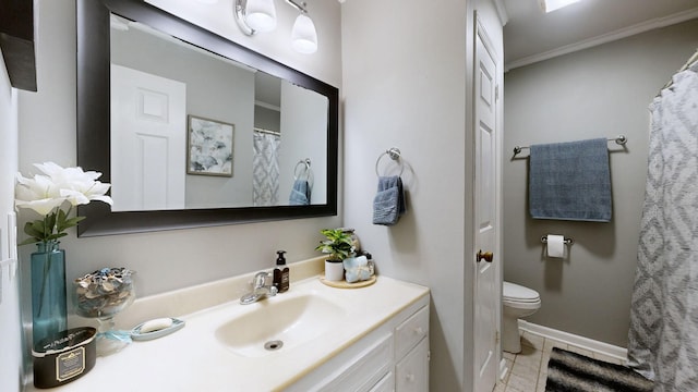 full bath featuring toilet, vanity, crown molding, baseboards, and tile patterned flooring