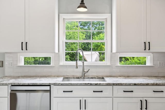 410 Springhouse Ct, Franklin, TN 37067 - kitchen featuring stainless steel dishwasher, a sink, and white cabinetry