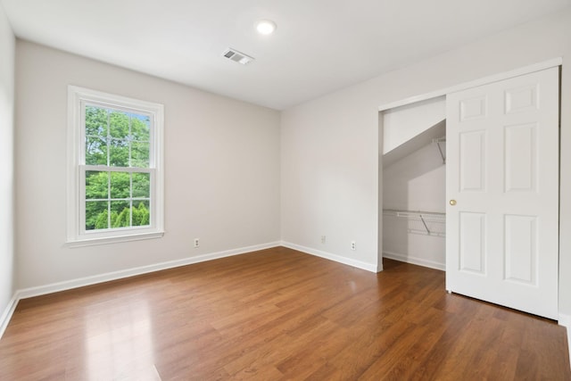 410 Springhouse Ct, Franklin, TN 37067 - unfurnished bedroom with wood finished floors, a closet, baseboards, and recessed lighting