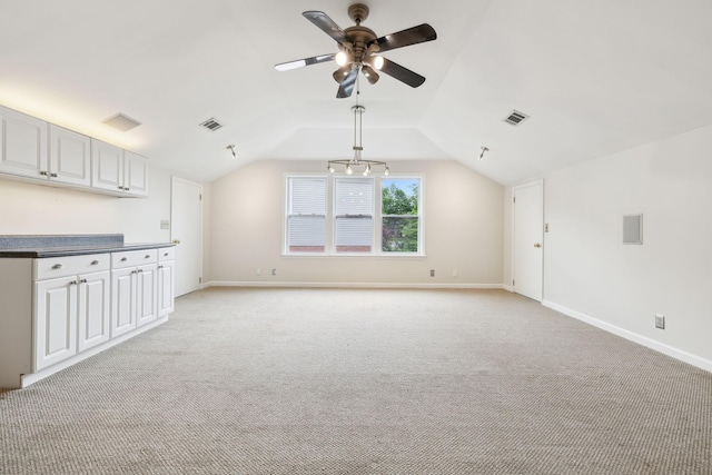 410 Springhouse Ct, Franklin, TN 37067 - unfurnished living room with a ceiling fan, lofted ceiling, light colored carpet, and baseboards
