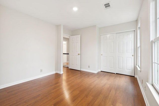 410 Springhouse Ct, Franklin, TN 37067 - unfurnished bedroom featuring wood finished floors, baseboards, a closet, and recessed lighting