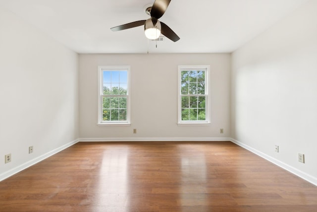 410 Springhouse Ct, Franklin, TN 37067 - spare room featuring ceiling fan, wood finished floors, and baseboards