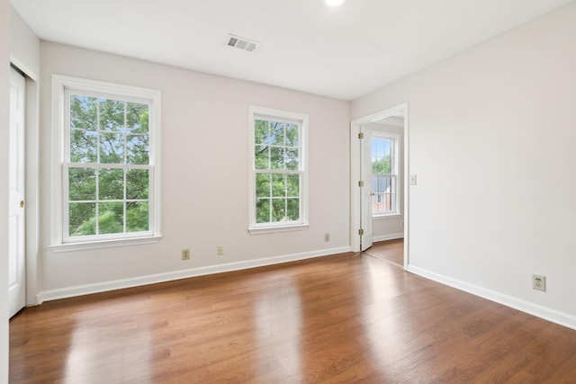 410 Springhouse Ct, Franklin, TN 37067 - spare room with wood finished floors, plenty of natural light, and baseboards