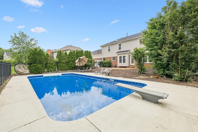 410 Springhouse Ct, Franklin, TN 37067 - view of swimming pool with a patio and a diving board