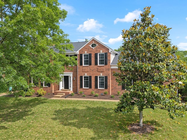 410 Springhouse Ct, Franklin, TN 37067 - view of front of home featuring brick siding, a front lawn, and roof with shingles