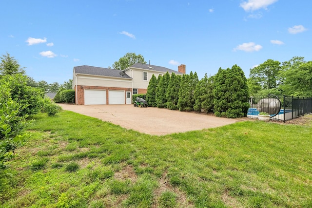 410 Springhouse Ct, Franklin, TN 37067 - view of yard with a garage and driveway