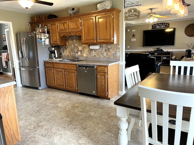1224 Whiteside Hill Rd, Wartrace, TN 37183 - kitchen with appliances with stainless steel finishes, a ceiling fan, a sink, and tasteful backsplash