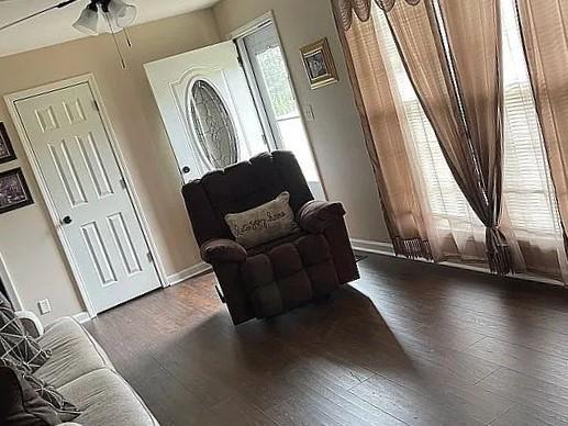 514 Wren Dr, Clarksville, TN 37040 - sitting room featuring wood finished floors, a ceiling fan, and baseboards
