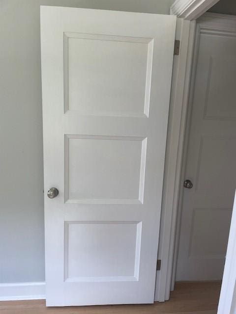detailed view of wood finished floors and baseboards