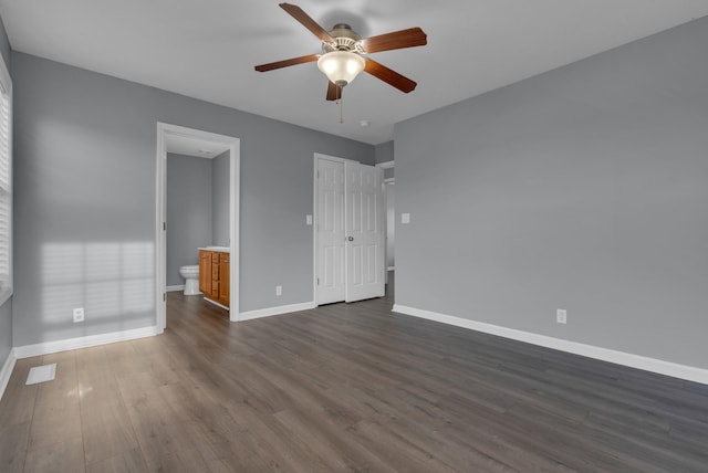 1493 Mcclardy Rd, Clarksville, TN 37042 - unfurnished bedroom with dark wood finished floors, baseboards, and ensuite bath