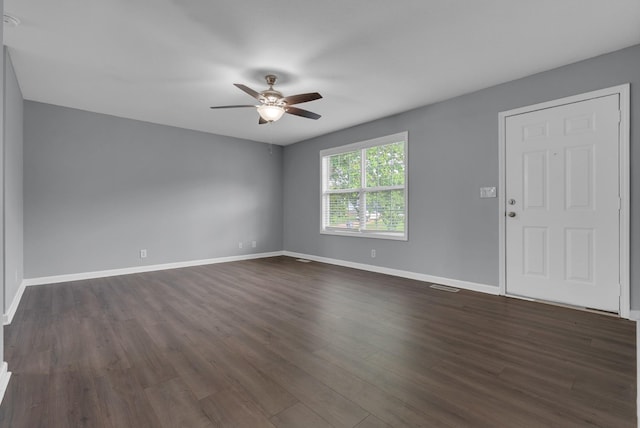 1493 Mcclardy Rd, Clarksville, TN 37042 - empty room featuring ceiling fan, dark wood-style floors, and baseboards